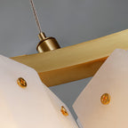 Detail of the Clérachic Willamette Alabaster Drum Chandelier, each stone panel pinned to the brass bar by one gold screw.