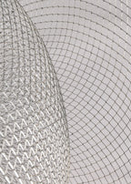 Close view of the fine silver wire mesh on the nested bowls of this Clérachic chandelier.