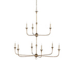 The Clérachic Wisp Grande chandelier's nine-arm frame fans out in warm pyrite bronze, unlit against plain white.