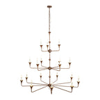 The Clérachic Wisp Grande chandelier's 18-arm, three-tier column stands tall in pyrite bronze on white.