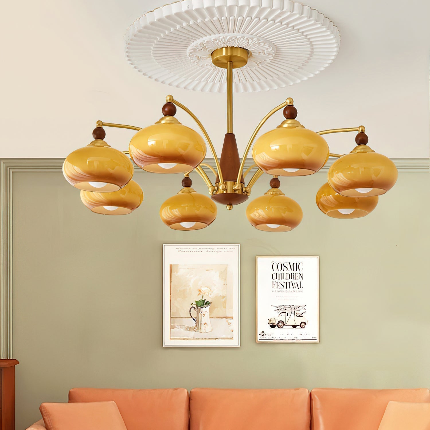 Clérachic Wood and Brass Chandelier with eight amber shades lighting a sitting room over a peach sofa.