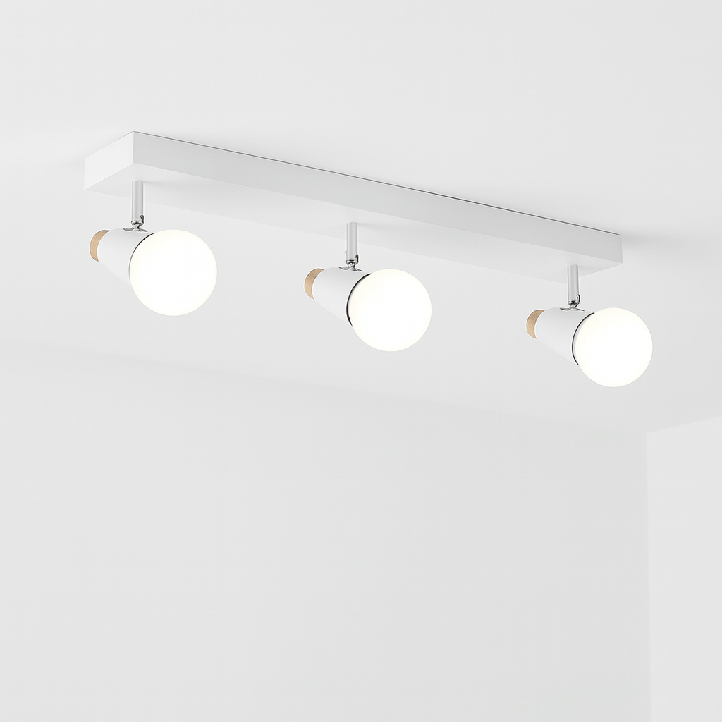 Clérachic white three-head ceiling spotlight bar with globe bulbs glowing, adjustable cone heads with wooden end caps.