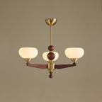 Three-light version of this Clérachic chandelier, with ribbed cream glass shades on wood arms, against a muted taupe backdrop.