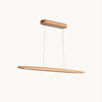 Beech Clérachic pendant with a lit slot along its length, hung from an oval canopy on thin wires, on an off-white background.