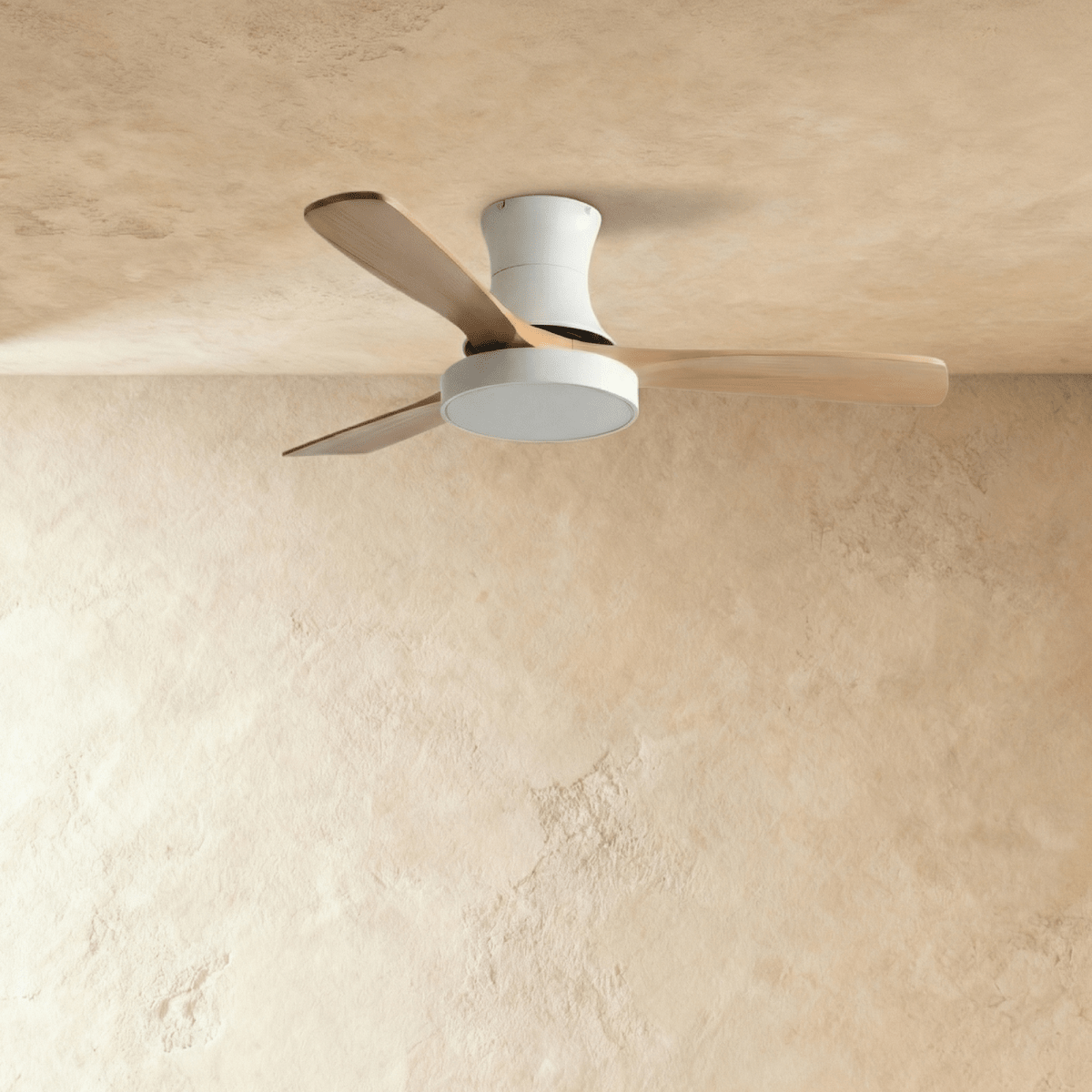 Clérachic low-profile ceiling fan in white with three pale wood blades, the round LED light panel switched off.