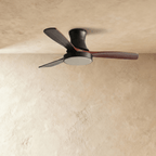 Clérachic low-profile ceiling fan in black with three dark walnut-toned blades, the round LED light panel unlit.