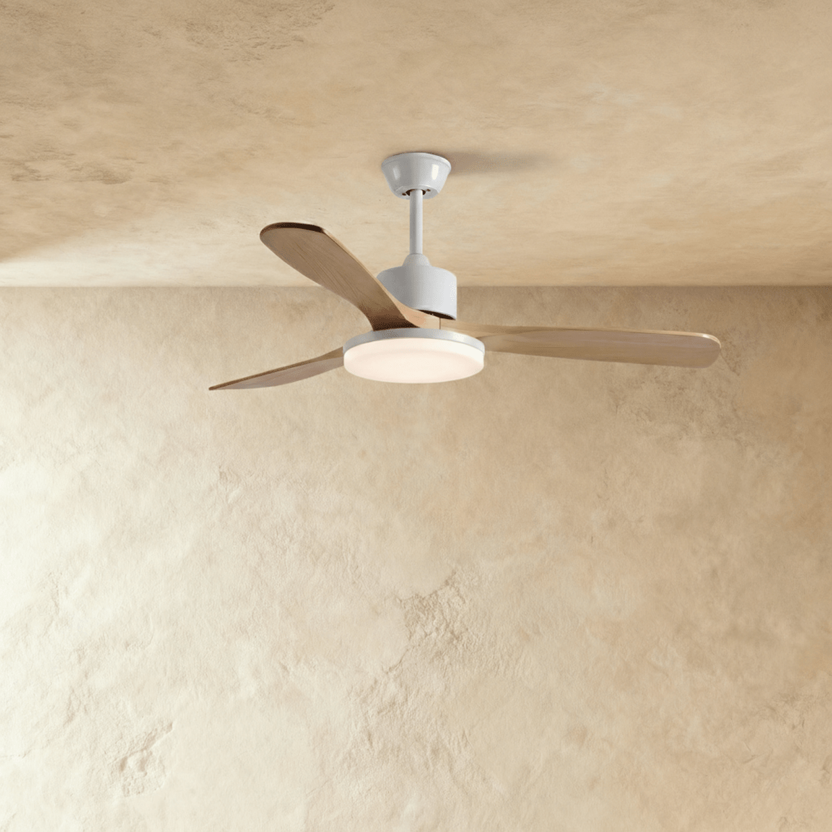 Clérachic ceiling fan on a short white downrod with three pale wood blades and a round LED light glowing underneath.