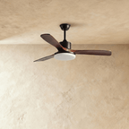 Clérachic ceiling fan on a black downrod with three dark walnut-toned blades, the round LED light panel unlit.