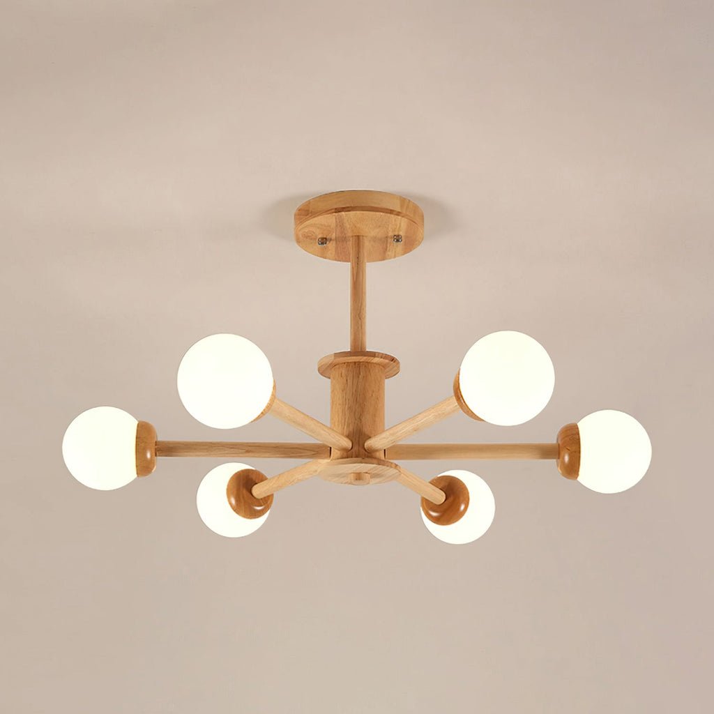 Light wood Clérachic ceiling light with six white globes on straight arms and a round wooden canopy, on a taupe ceiling.