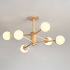Six-globe light wood ceiling light from Clérachic, angled slightly, with a round wooden canopy against a pale grey ceiling.