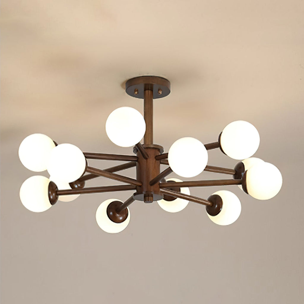 Walnut Clérachic ceiling light with a dozen white globes on dark branching arms, pictured against a warm grey ceiling.