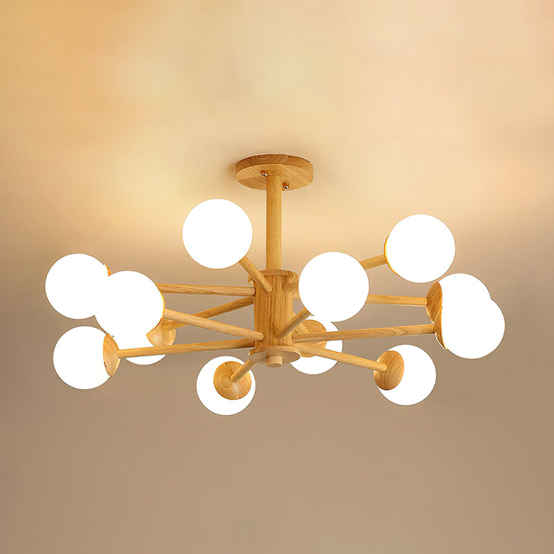 Lit wood and white ceiling light from Clérachic with a dozen globes crowded on its arms, against a glowing ceiling.