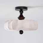 An unlit Clérachic ceiling light on a grey backdrop, showing the pleated beige drum, turned dark stem and ball finial below.