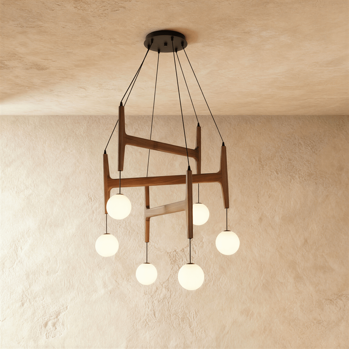 Clérachic's chandelier in dark red mahogany wood, six frosted glass globes suspended from its layered frame.