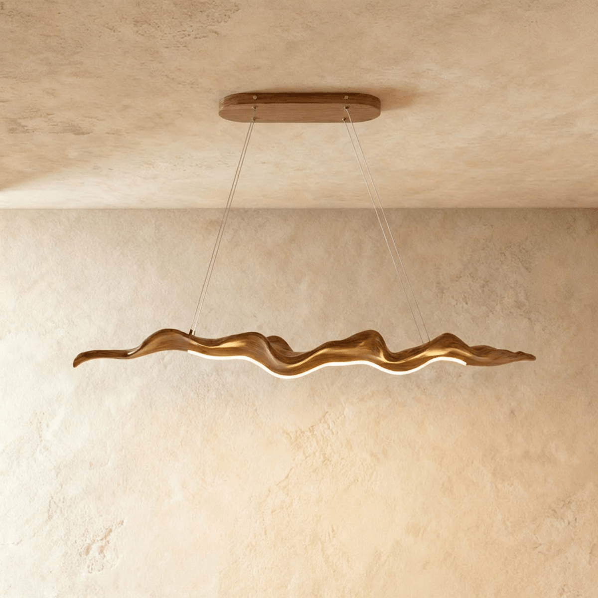 Clérachic longest wavy wood-finish chandelier on two cables from an oval canopy, its rippling edge lit by a warm LED line below.