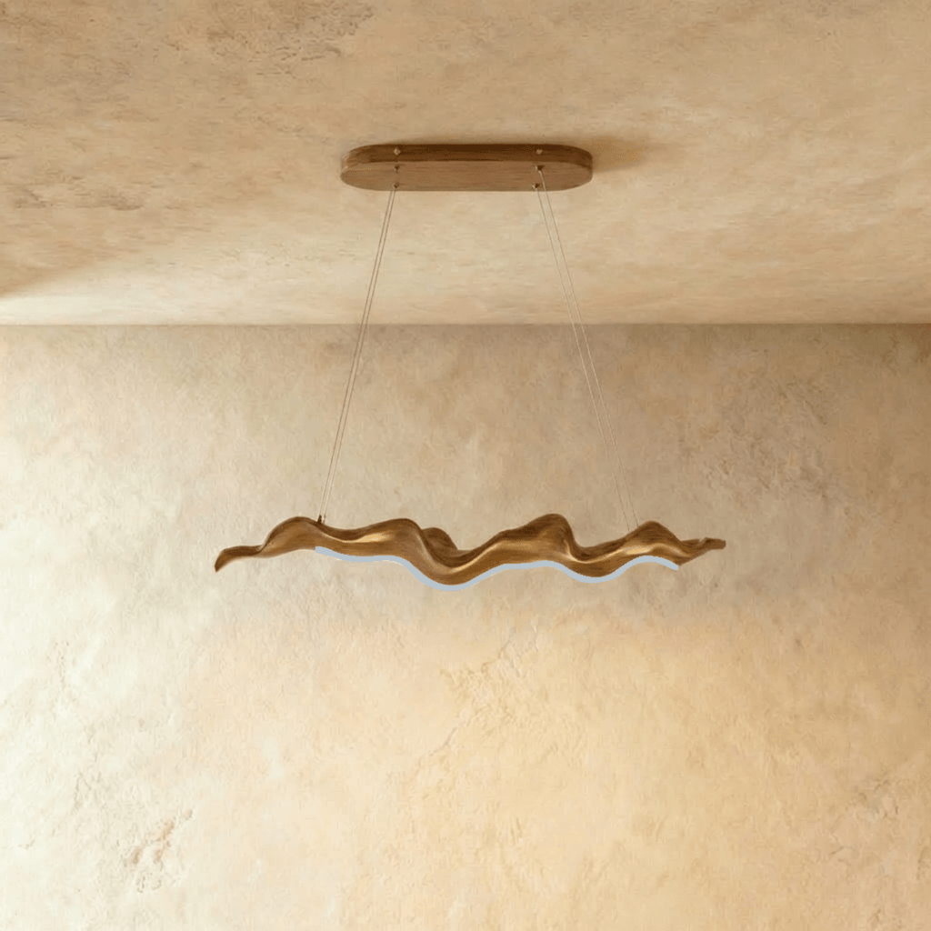 Clérachic wavy wood-finish chandelier on two cables, shown lit with a cool white LED line along its curved underside.