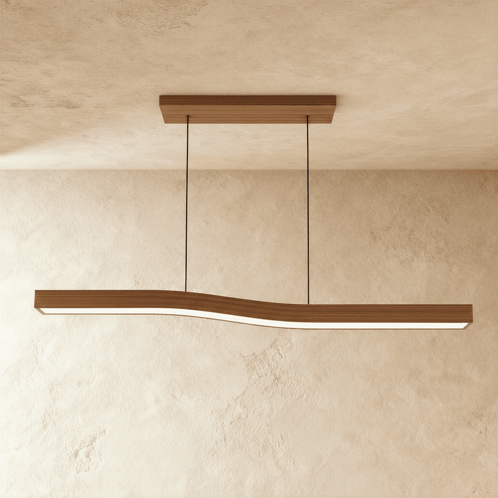 Side angle of the Clérachic walnut bar pendant shows its S-curve silhouette suspended on two thin cables.