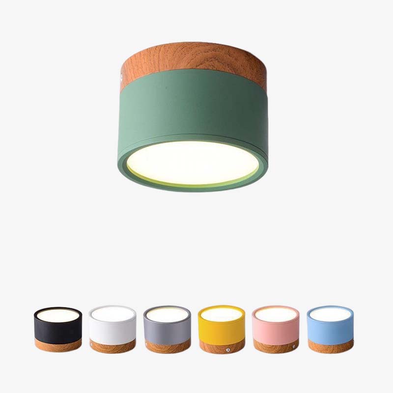 Green Clérachic Wood-Grain Cylinder Ceiling Light lit on a plain background above six alternative body colours.