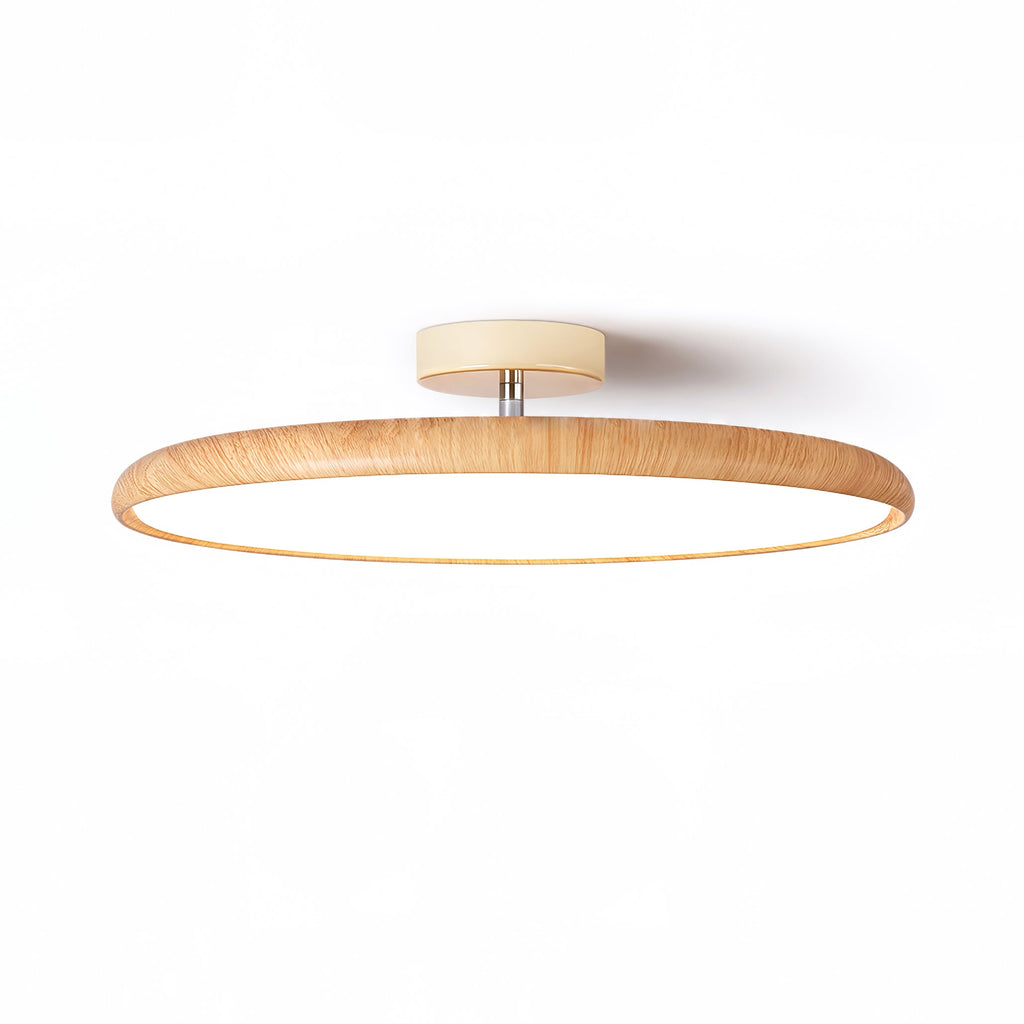 Light wood-grain ring and cream canopy of this Clérachic ceiling light, seen from the side on a white backdrop.
