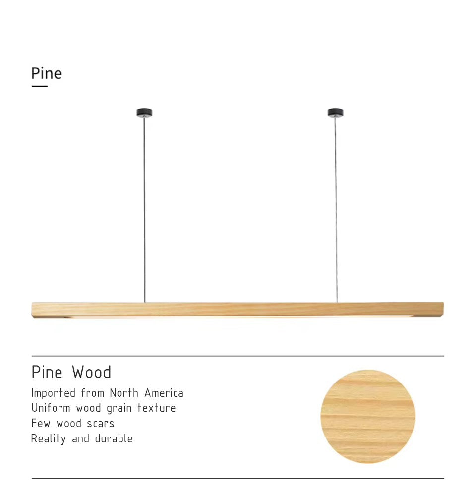 Clérachic pine wood beam pendant hanging from two thin cables with small round black ceiling canopies.