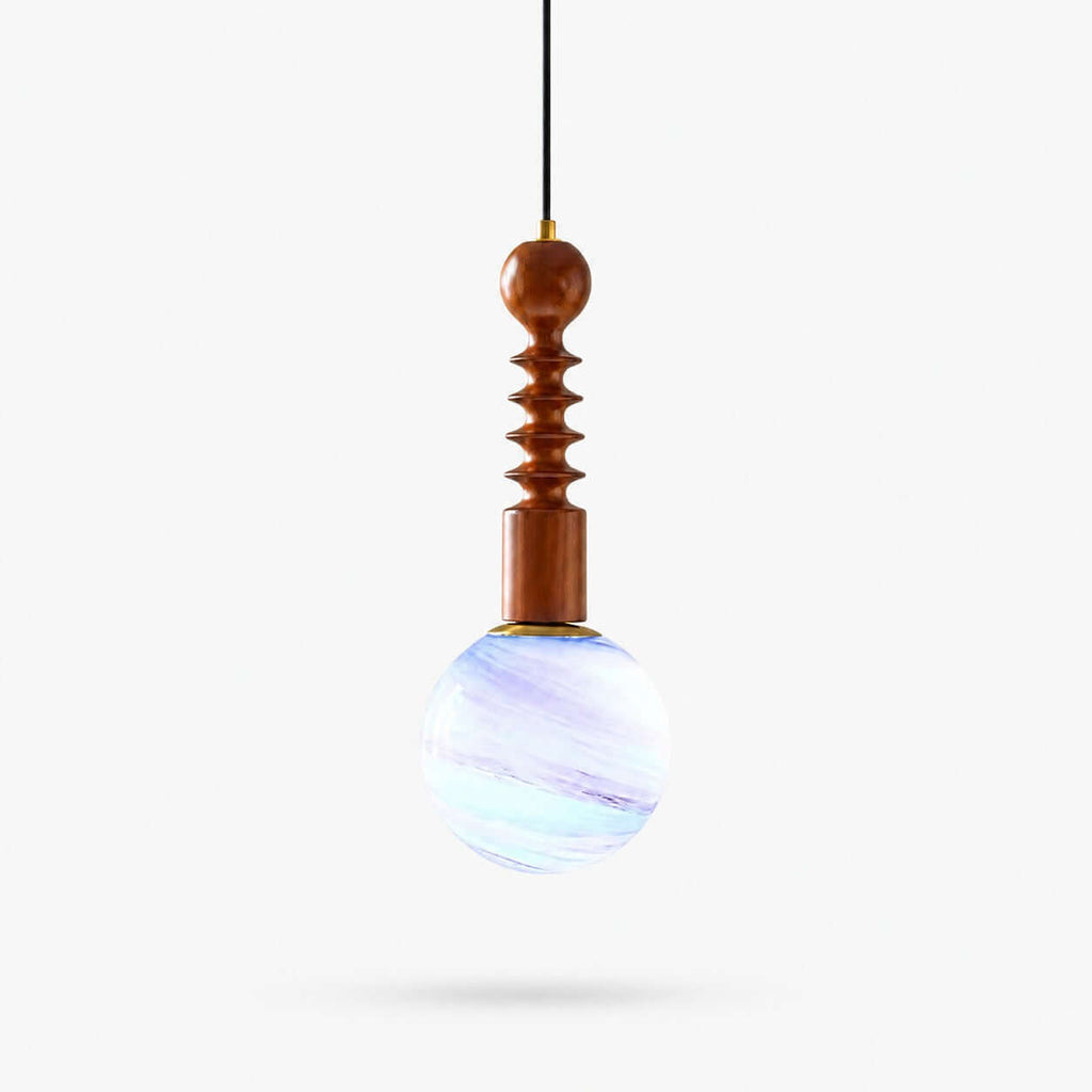 Blue-and-white swirled glass globe below a turned wood stem on this Clérachic pendant, on a plain white backdrop.