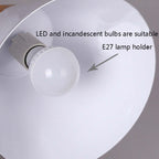 Close-up callout inside the Clérachic cone pendant's shade, showing the E27 holder fitted with a screw-in bulb.