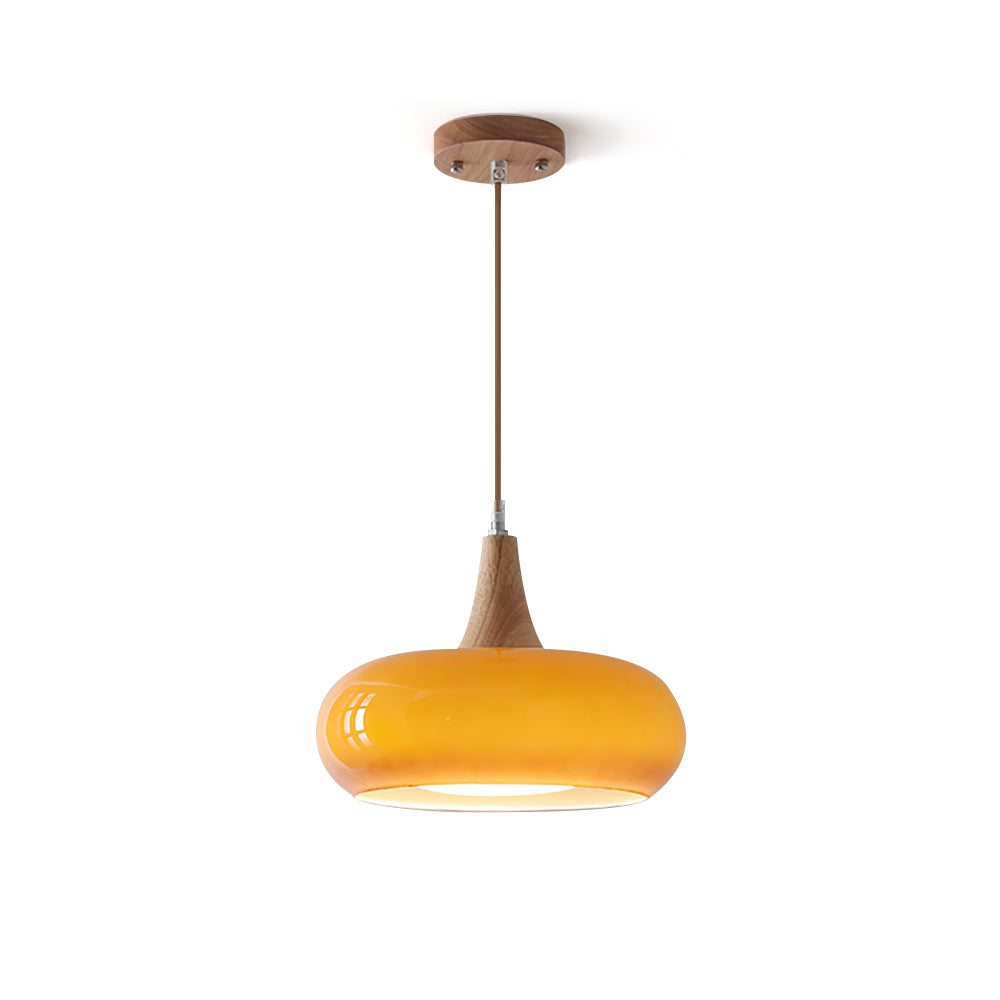 Clérachic Wood-Top Glass Pendant Light shown on white, the amber shade capped by a turned wood cone above a braided cord.