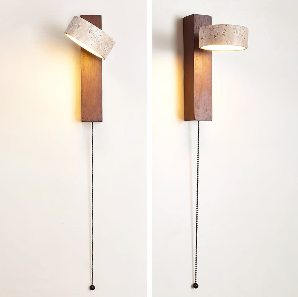 Two views of a Clérachic wall light in walnut-coloured wood with a pull cord, one with its head tilted up and lit, one with it turned out.