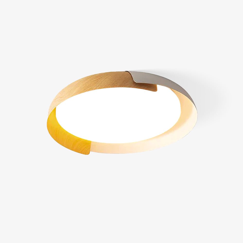 A light wood and white Clérachic ceiling light, shown at a slight angle with the diffuser lit, on a bright white backdrop.