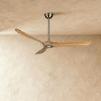 Clérachic ceiling fan with natural wood blades and a brushed nickel downrod, canopy and hub, photographed in the studio