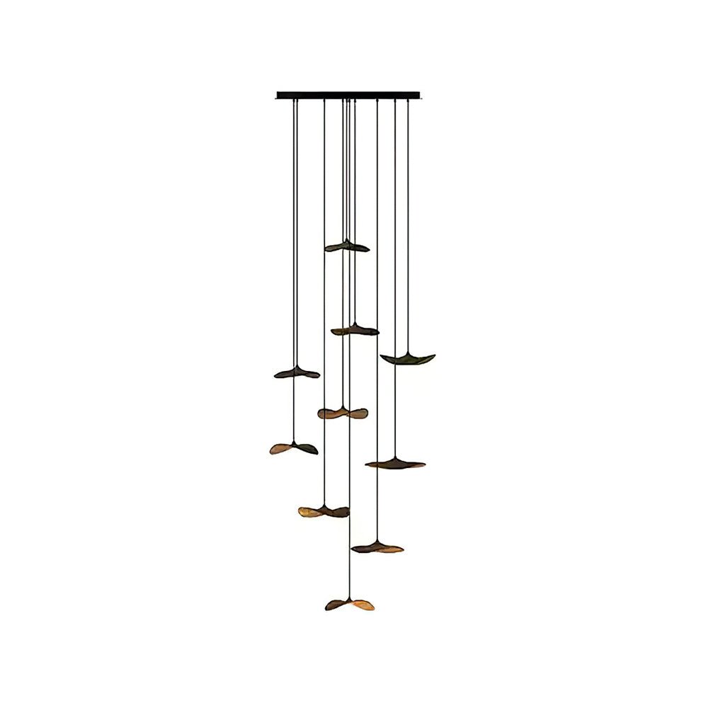 Cluster of walnut-colour Clérachic leaf pendants on a black canopy, in a tall layout against white.