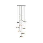 Cluster of walnut-colour Clérachic leaf pendants on a black canopy, in a tall layout against white.