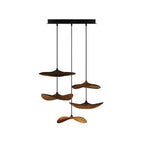 Three-cable Clérachic pendant light with six walnut-colour leaves at staggered heights, on a white background.