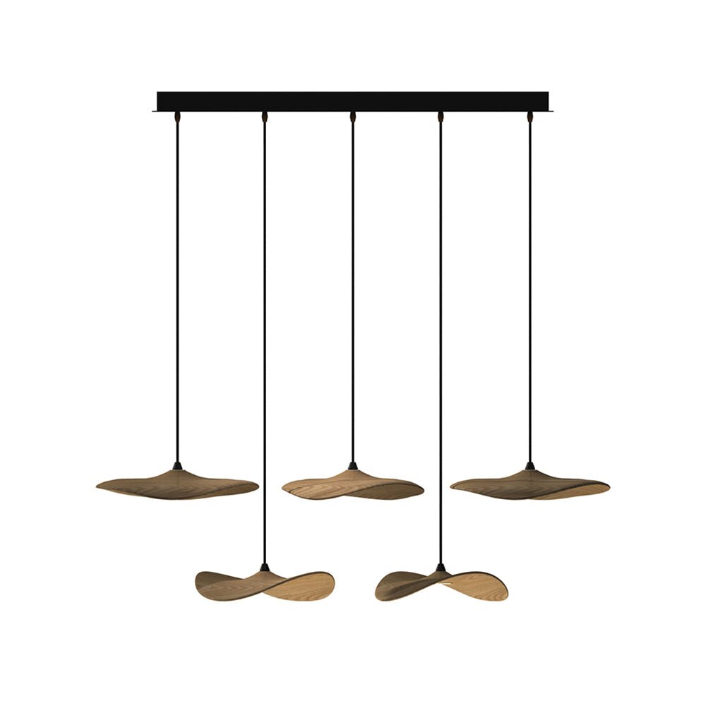 Five Clérachic leaf pendants in walnut colour hung at two levels from a long black canopy, on white.