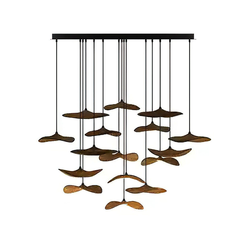 Large cluster of walnut-colour Clérachic leaf pendants from a wide black canopy, hung at many levels, on white.