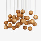 A large Clérachic wood-sphere cluster with dozens of spheres at varied heights on a plain white backdrop.