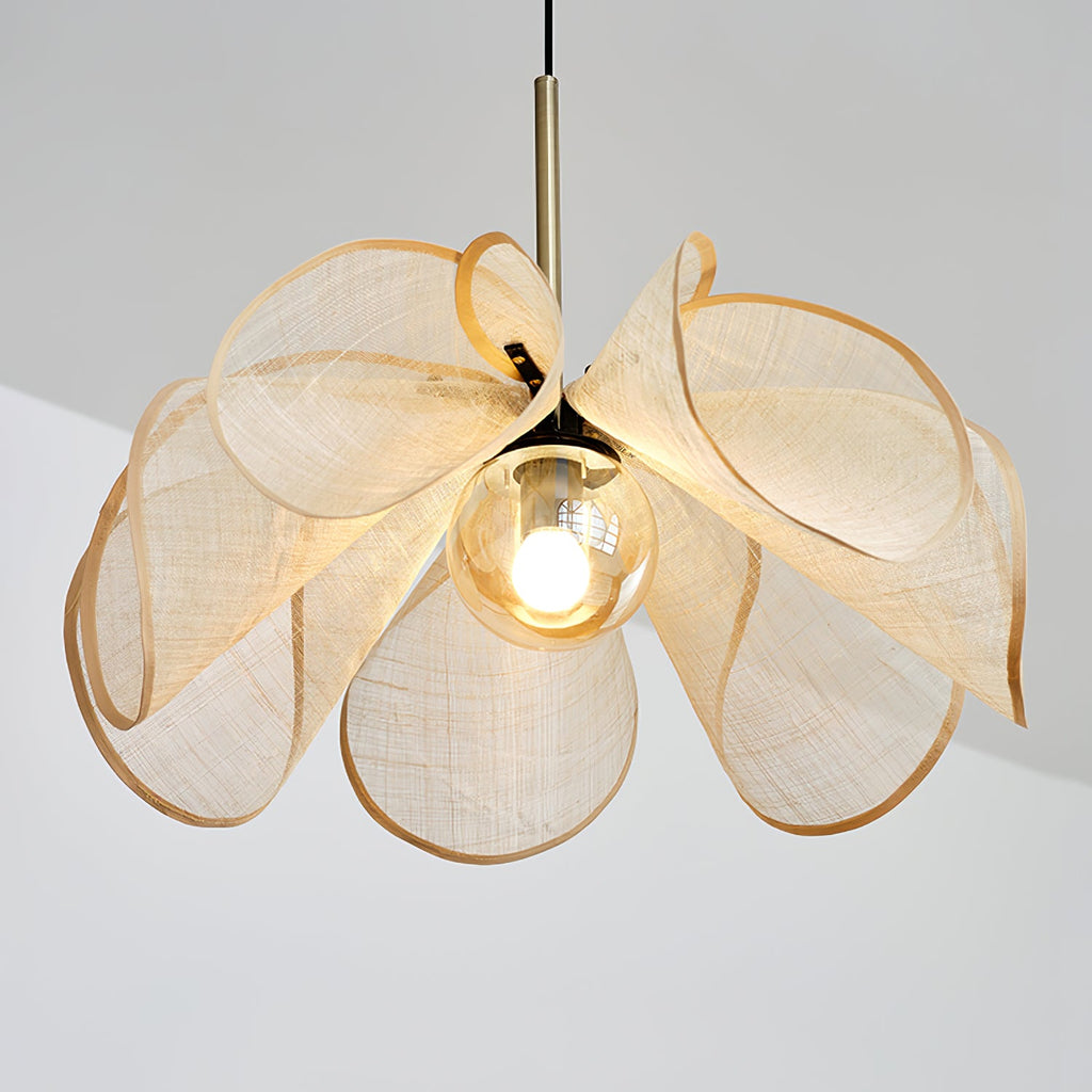 Looking up into the shade of this Clérachic pendant, where the woven petals curl open around a round bulb.