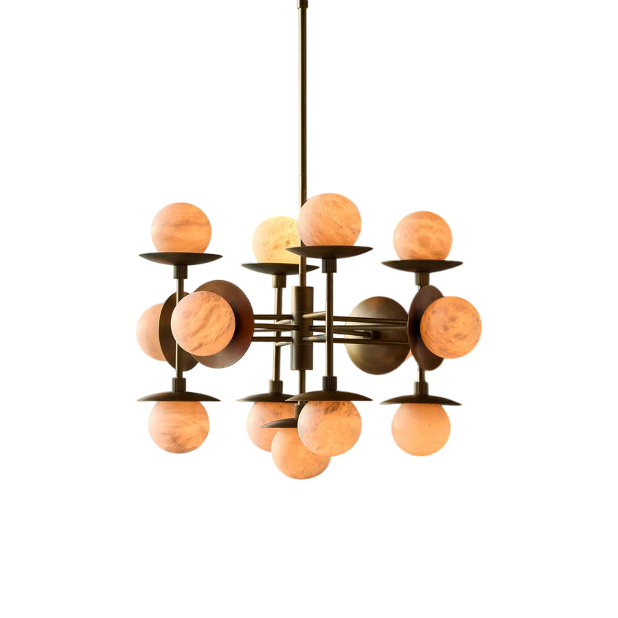 The Clérachic Xenon chandelier turned slightly, showing its staggered brass tiers and the warm veining in each alabaster shade.