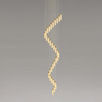The Clérachic Zeal chandelier at its longest drop, alabaster tubes coiling more than three metres from ceiling to base.