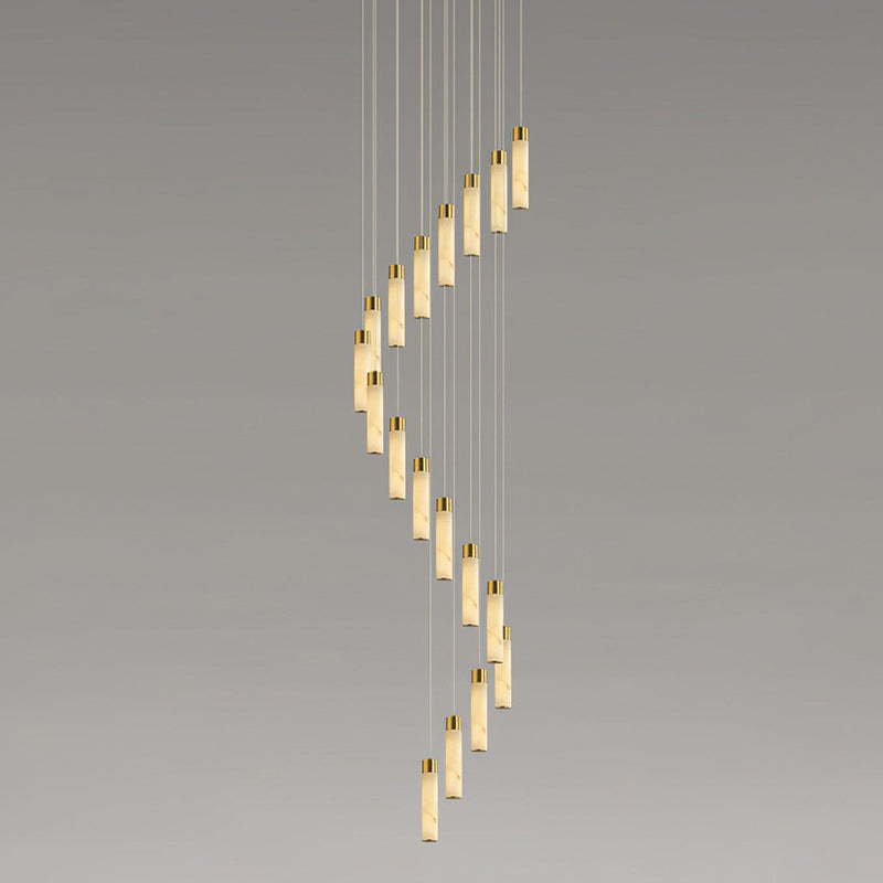The Clérachic Zeal chandelier stretched over three floors, the helix of alabaster drops reading as one falling line.