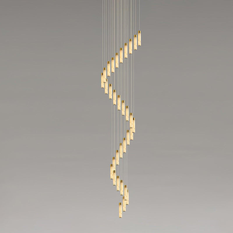 The Clérachic Zeal chandelier in profile, its twisting column of stone drops narrowing toward the lowest tube.
