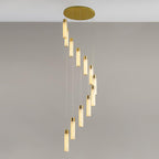 The Clérachic Zeal chandelier from a low angle, brass canopy overhead and the alabaster drops receding into the spiral.