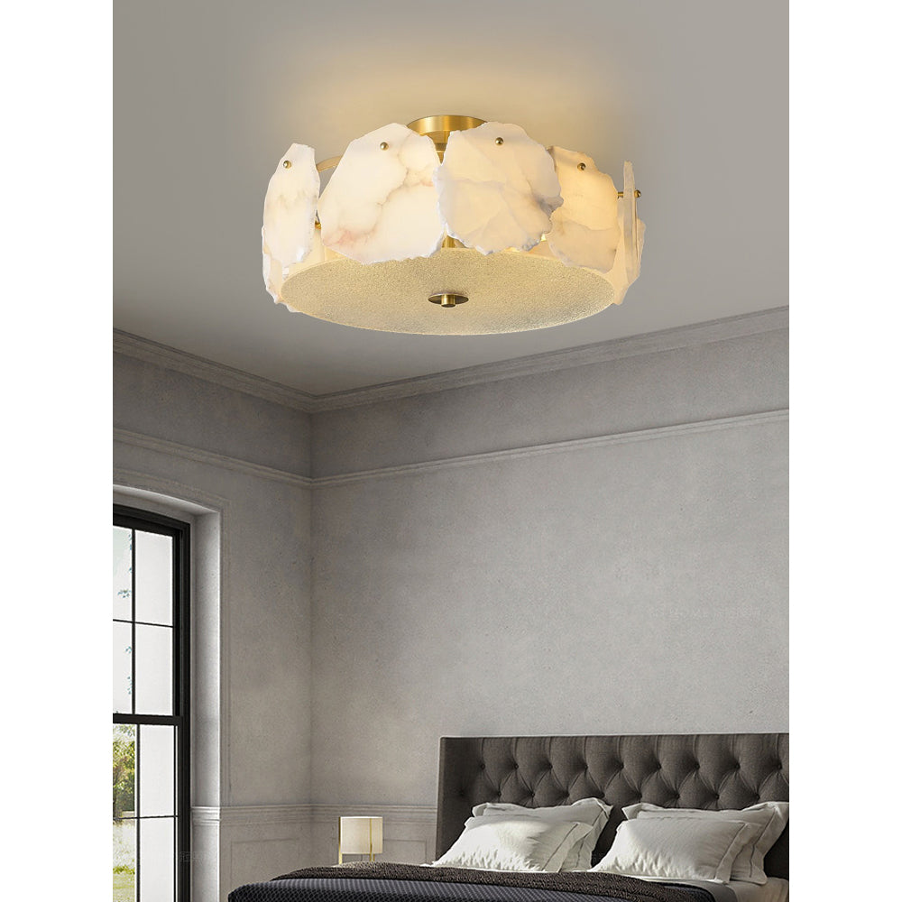 Clérachic flush mount in a bedroom with a tufted headboard and a tall black-framed window alongside.