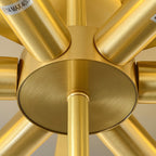 The Clérachic light's brass socket hub seen from below, six brushed brass sockets radiating from the centre.