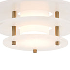 Underside detail of the Clérachic Zovena light, the two lower alabaster discs lit from within so the glow rings the edge of each plate.