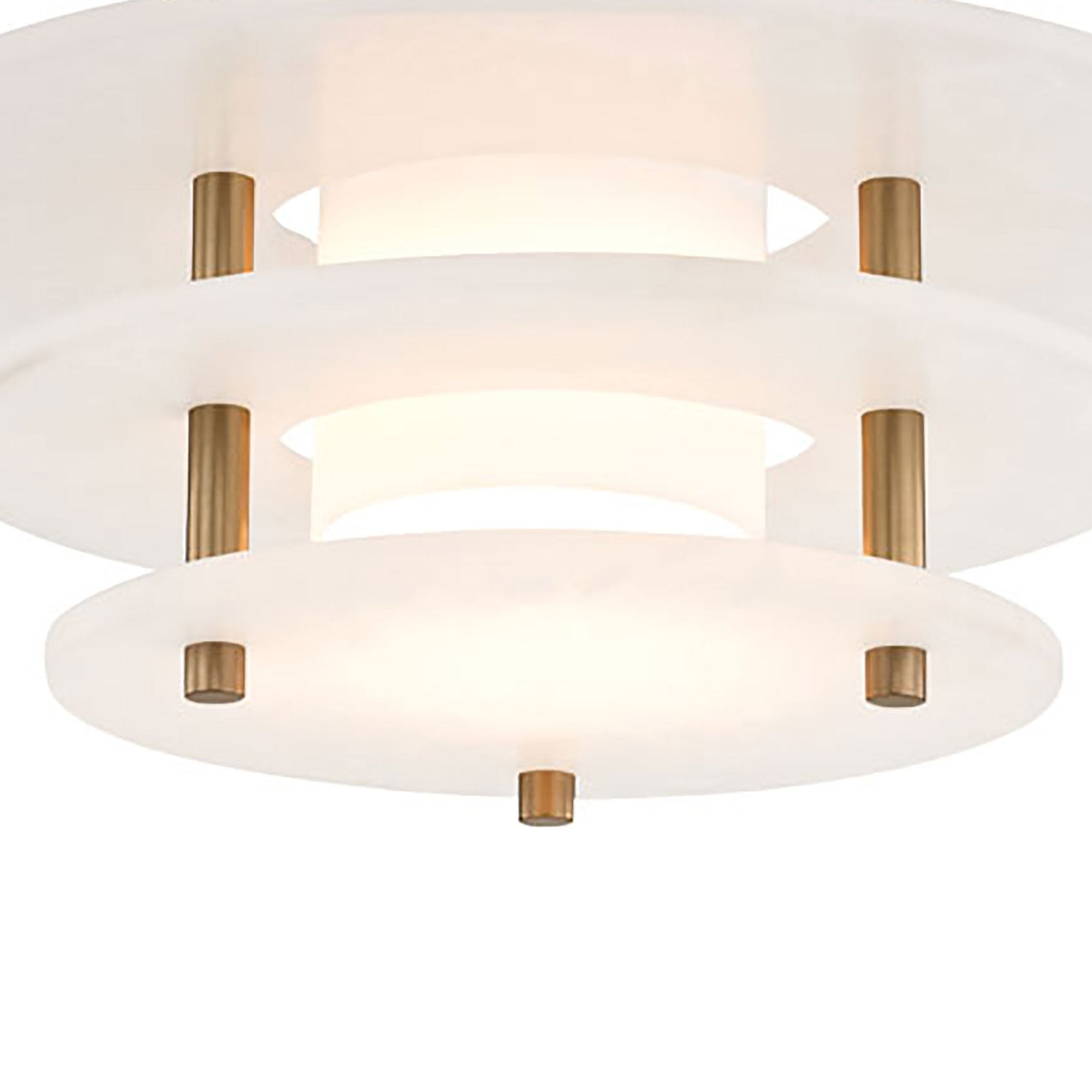 Underside detail of the Clérachic Zovena light, the two lower alabaster discs lit from within so the glow rings the edge of each plate.