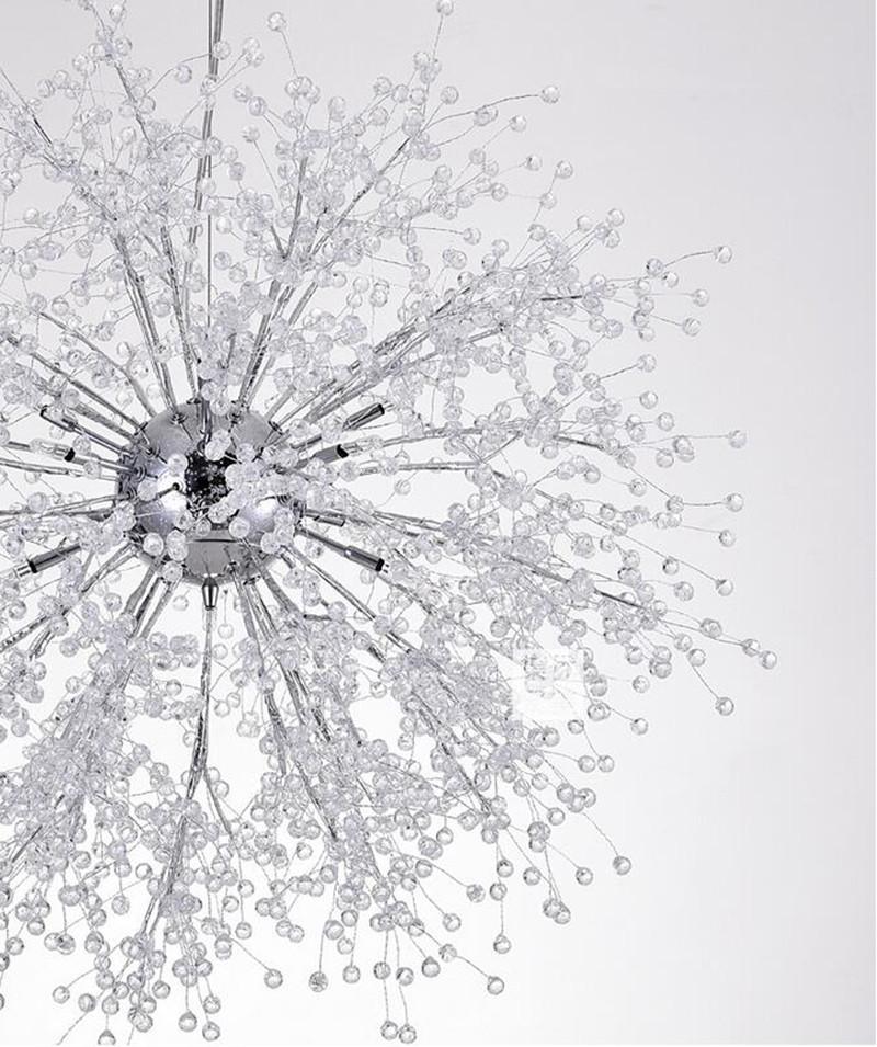 Product shot of this Clérachic chandelier in a chrome finish, its crystal-tipped branches spread wide on a plain backdrop.