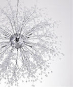 Product shot of this Clérachic chandelier in a chrome finish, its crystal-tipped branches spread wide on a plain backdrop.