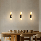 Clérachic marble column pendant detail where the cord meets the stone