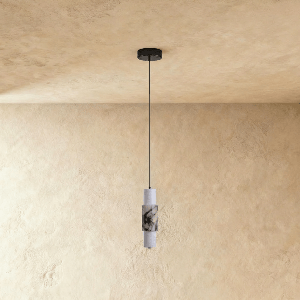 Clérachic marble pendant lit, the stone glowing warm from within
